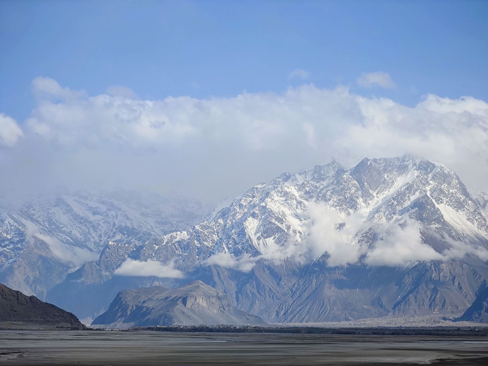 Braided riverbed leading toward the snow peaks of the Karakoram